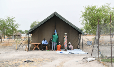 Dr Aja Paul operates in a tent at a Carter Center outreach in Yuai, Jonglei State, 