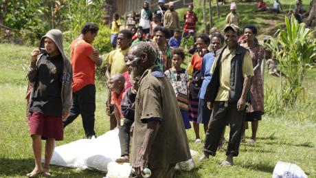 People smiling at the airstrip