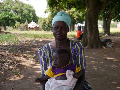 Naume Agwero with her baby. 