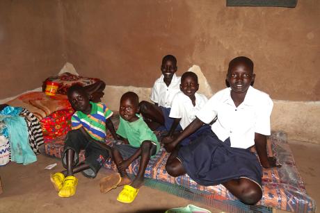 The children are happy to sleep on a mattress for the first time in a long time. 