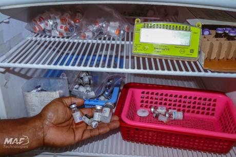 Safely stored and ready when needed—vaccines inside a newly installed solar-powered fridge.