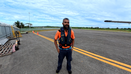 Titus Oaeke on airstrip