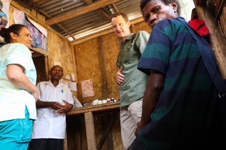 Health patrol team at Yambaitok Health Centre (L–R): Nurse Marino Vickers, CHW Patrick Dickson, Dr Tim Robinson, and a patient.