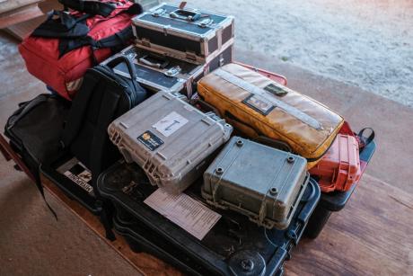 Medical equipment cases on aircraft loading trolly