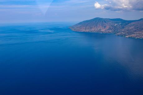 An island and deep water channel surrounding it