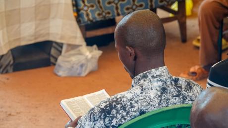 Samuel Kourouma, reading the Bible