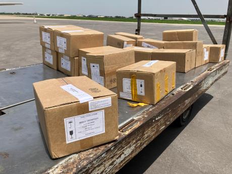 Boxes of Bible waiting for the flight